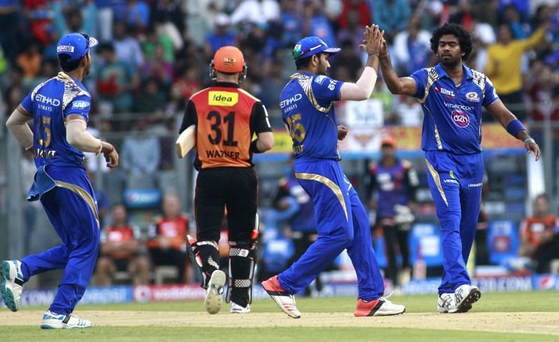 Lasith Malinga and Rohit Sharma celebrating the wicket of David Warner (Credits: prokerala.com)