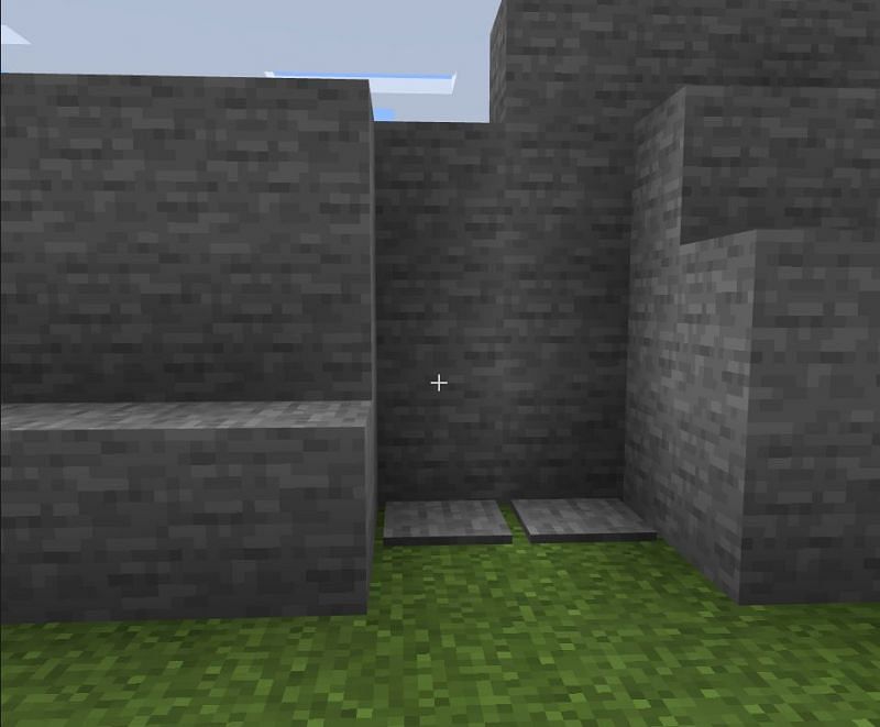 Placing to stone blocks to make secret door Minecraft