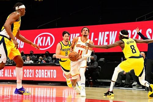 Trae Young drives to the rim [Image: Scott Cunningham/NBAE]