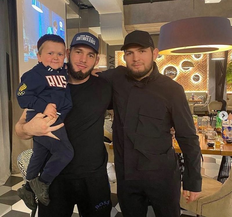 Khabib Nurmagomedov poses for a photo with Hasbulla Magomedov.