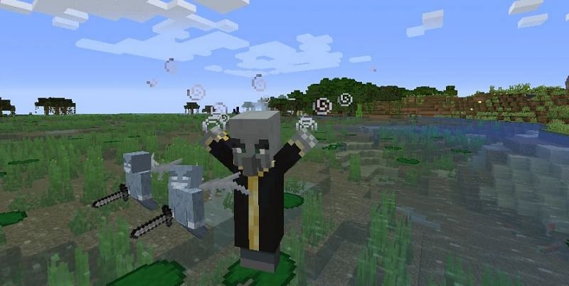 An Evoker summoning two Vexes (Image via Minecraft.fandom)