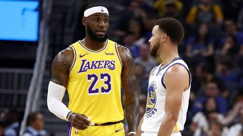 Golden State Warriors' Stephen Curry and LA Lakers' LeBron James