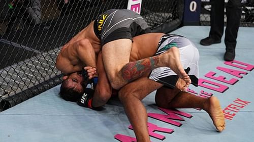 Andre Muniz breaks Jacare Souza's right arm at UFC 262