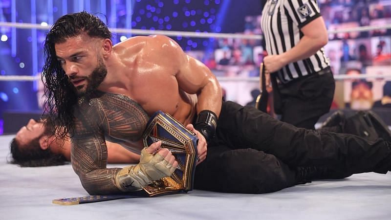 Roman Reigns with the WWE Universal Championship