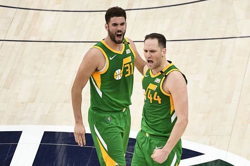 Bojan Bogdanovic #44 and Georges Niang #31 of the Utah Jazz celebrate a three point play.