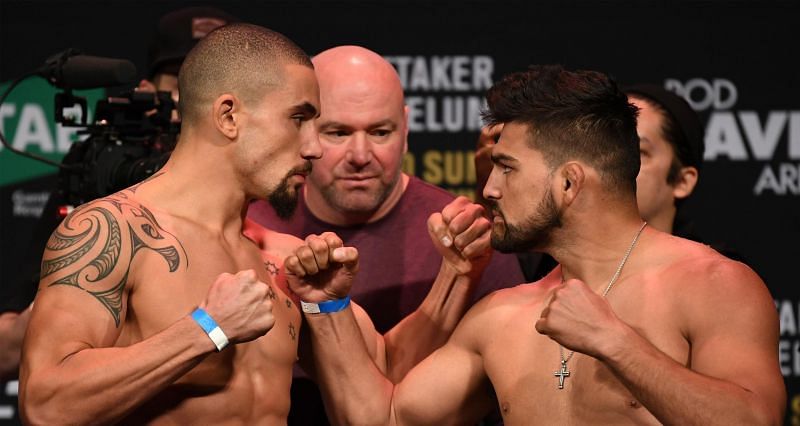 Robert Whittaker (Left) and Kelvin Gastelum (Right) during UFC 234 weigh-in faceoff