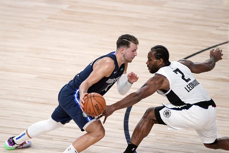 Luka Doncic #77 of the Dallas Mavericks drives toward the basket.