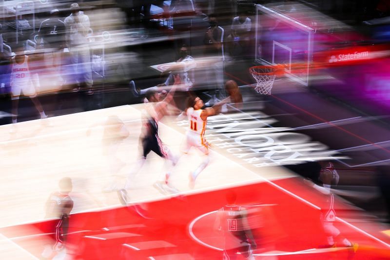 Trae Young #11 of the Atlanta Hawks goes up for a layup.