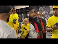 Tyron Woodley and Jake Paul in the locker room
