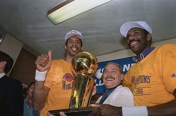 Kareem(L) with the NBA trophy
