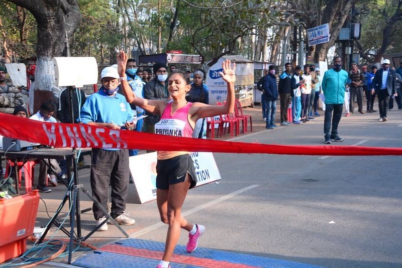 Priyanka touching the finish line at the National Championships after qualifying for the Tokyo Olympics. (Source: Facebook)