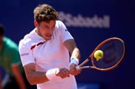 Pablo Carreno Busta hits a backhand