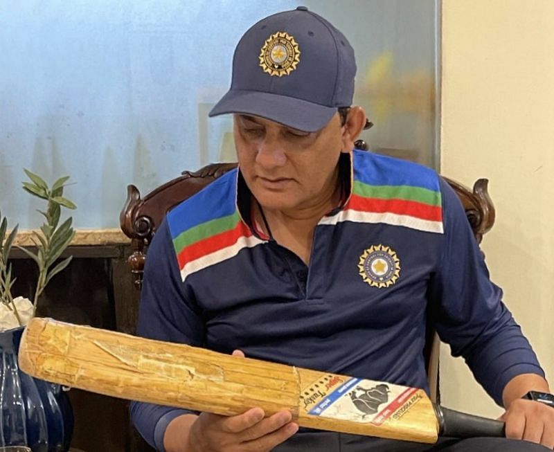 Mohammad Azharuddin with the bat with which he created a world record. Pic: @azharflicks/ Twitter