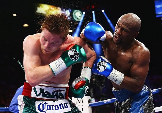 Does Canelo Alvarez have more belts than Floyd Mayweather?