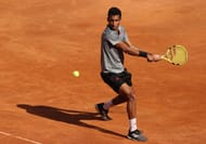 Felix Auger-Aliassime prepares for a backhand