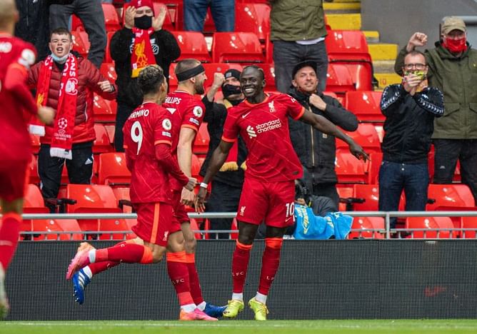 Sadio Mane reminds fans of his quality as Liverpool seal Champions League place