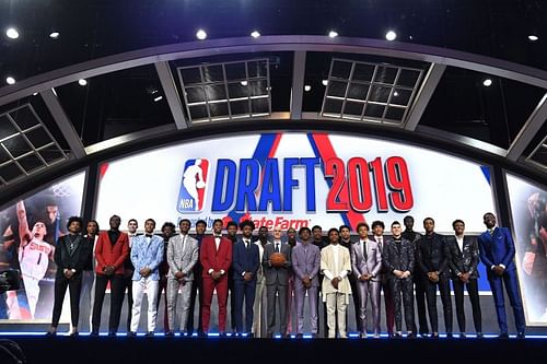 Draft prospects stand on stage with NBA Commissioner Adam Silver before the start of the 2019 NBA Draft.