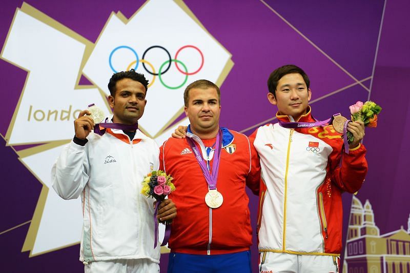 Vijay Kumar (left) on the podium with his silver medal at the 2012 London Olympics