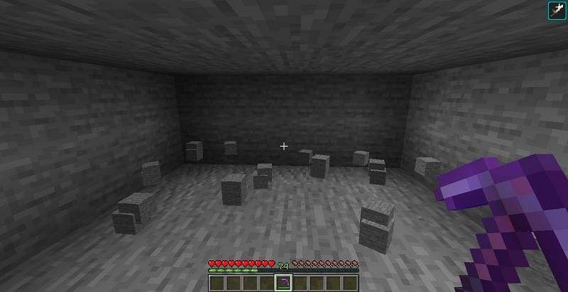 Mining stone with silk touch pickaxe (Image via Minecraft)