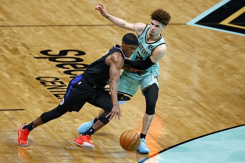 Rajon Rondo #4 of drives to the basket against LaMelo Ball #2.