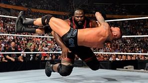What is Mark Henry's record at The Olympics?