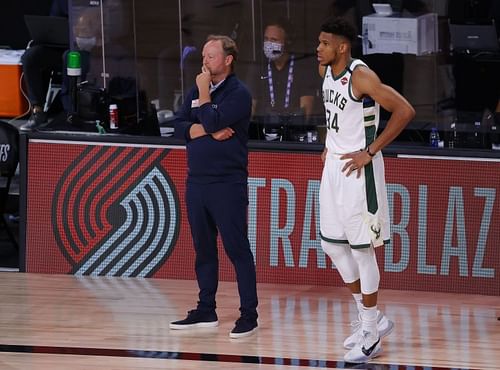 Mike Budenholzer and Giannis Antetokounmpo (#34) of the Milwaukee Bucks