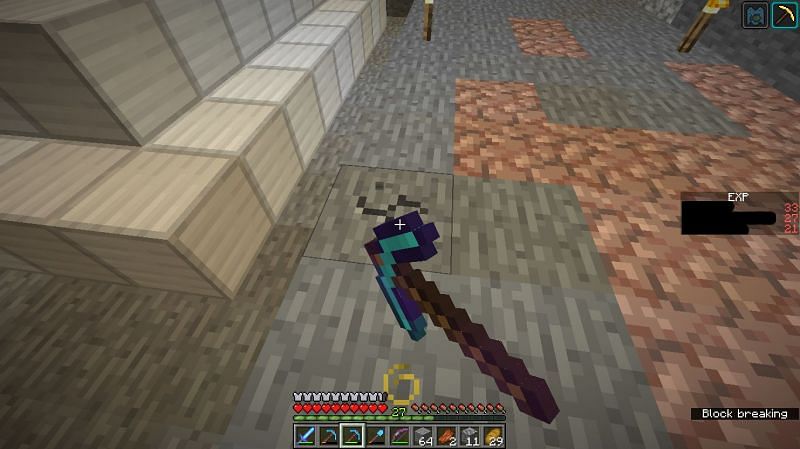 A Minecraft player mining with the Haste effect (Image via Mojang)
