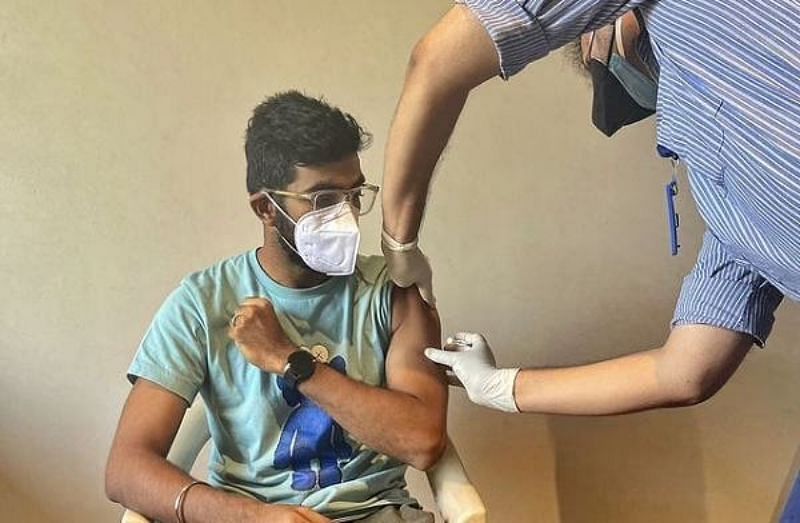 Jasprit Bumrah receives the first dose of the COVID-19 vaccine. Pic: Jasprit Bumrah/ Twitter