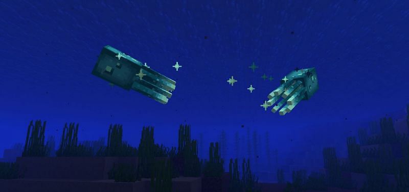 Two Glow Squid buddies enjoying the waters (Image via Minecraft)