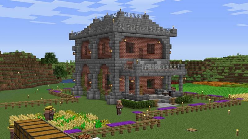 An amazing Brick house with Stone Bricks and Iron Bars to compliment it (Image via u/BrudasBetus on Reddit)
