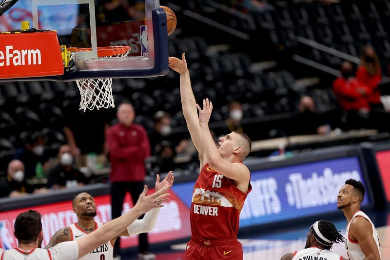 Nikola Jokic #15 of the Denver Nuggets puts up a shot.