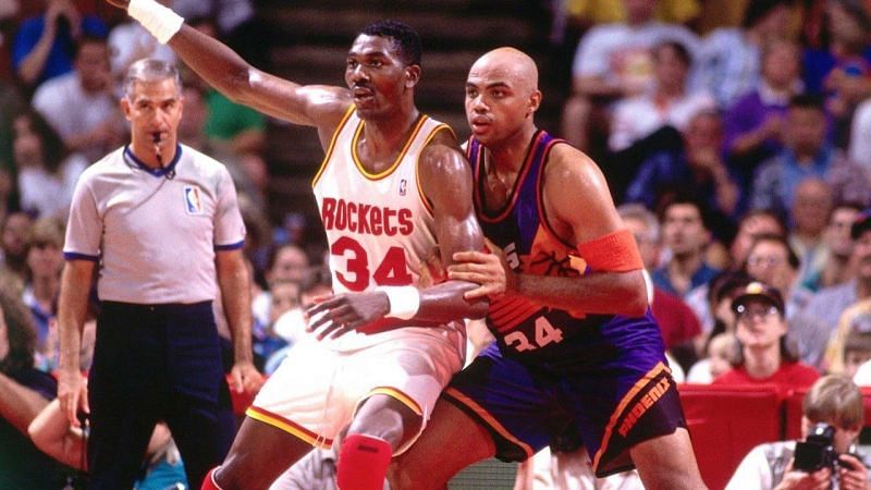 Houston Rockets&#039; Hakeem Olajuwon with the Phoenix Suns&#039; Charles Barkley