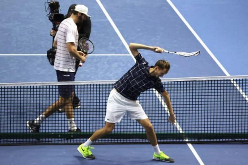 Daniil Medvedev smashes his racquet after losing to Reilly Opelka at the 2020 St. Petersburg Open