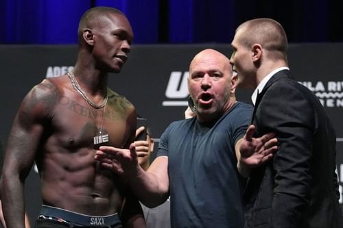 Israel Adesanya (left), Dana White (center) & Marvin Vettori (right) [Image Credits- MMA Mania]