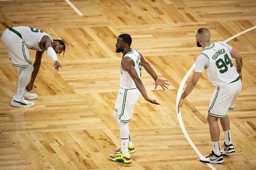 Kemba Walker (#8) of the Boston Celtics reacts with Evan Fournier (#94).