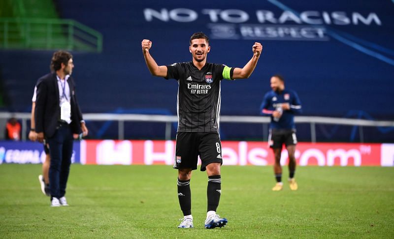 Houssem Aouar celebrates a win with Lyon