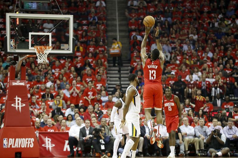James Harden (#13( of the Houston Rockets takes a three-point shot.