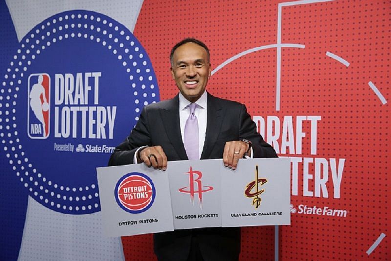 NBA Deputy Commission Mark Tatum with the winners of the top three picks