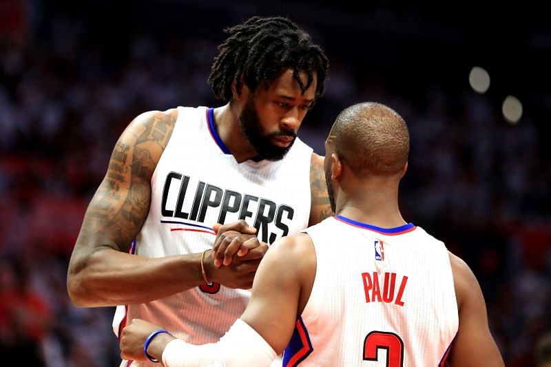 DeAndre Jordan #6 talks with Chris Paul #3 during the second half of a Game 7.