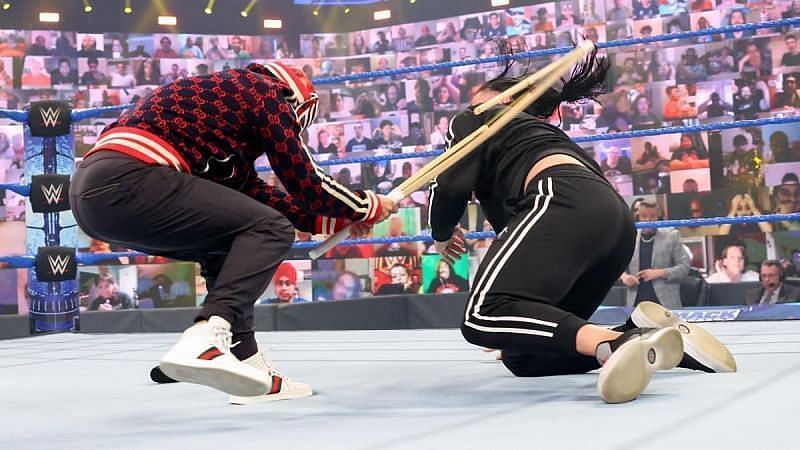 Rey Mysterio attacked Roman Reigns with a kendo stick on WWE SmackDown