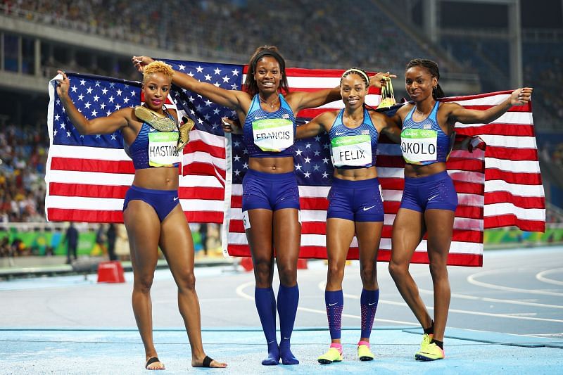 (L-R) Natasha Hastings, Phyllis Francis, Allyson Felix and Courtney Okolo of the United States react after winning gold in the Women&#039;s 4 x 400 meter Relay on Day 15 of the Rio 2016 Olympic Games