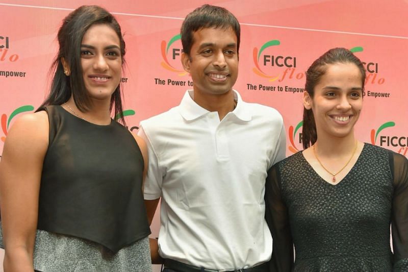 Pullela Gopichand (centre) with PV Sindhu and Saina Nehwal (right)