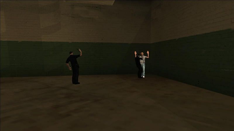 Police beating up a random pedestrian in a police station in GTA San Andreas (Image via GTA Wiki)