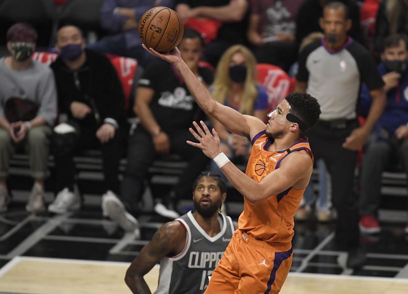 Devin Booker #1 goes up for a layup.