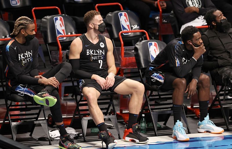 Nicolas Claxton (#33), Blake Griffin (#2) and Jeff Green (#8) of the Brooklyn Nets