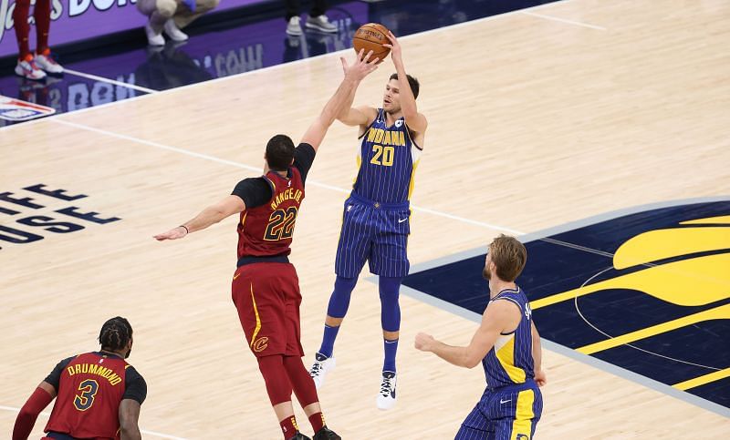 Indiana Pacers&#039; Doug McDermott #20, attempting a jumper over Cleveland Cavaliers&#039; Larry Nance Jr. #22