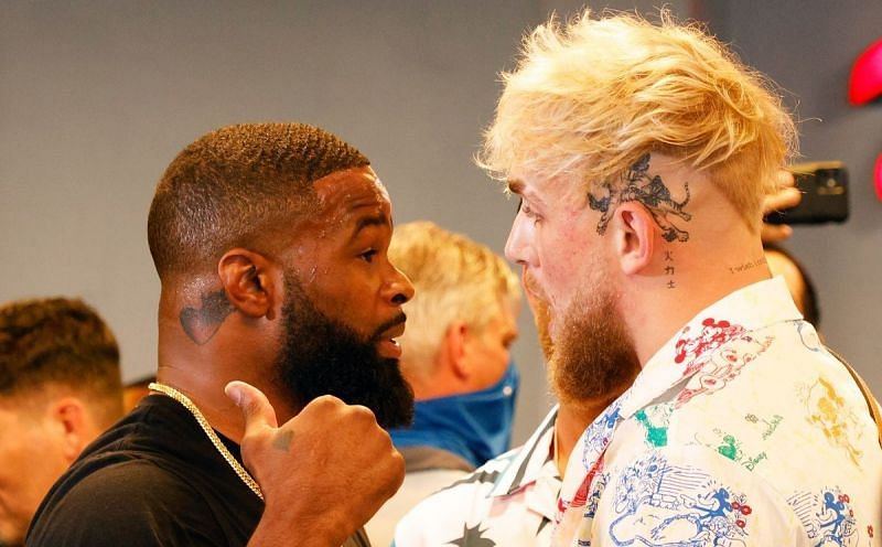 Tyron Woodley (left); Jake Paul (right)