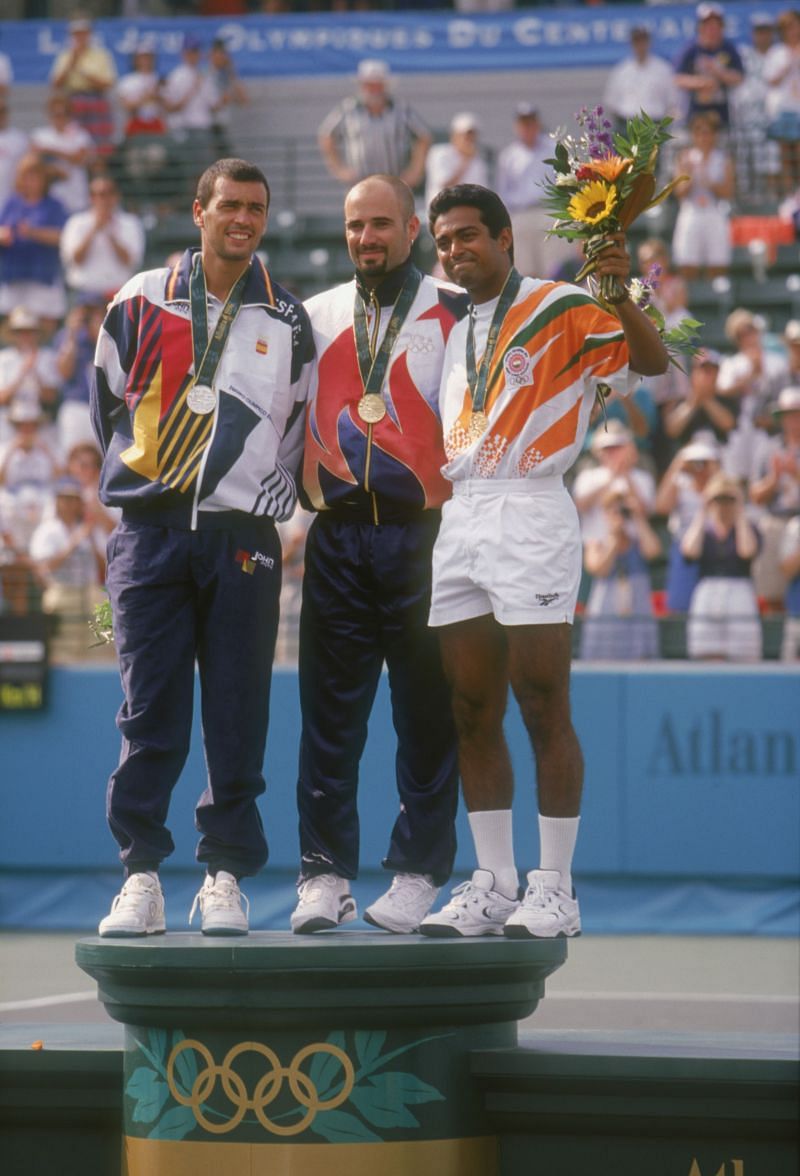 Leander Paes (right) of India wins bronze in the men&#039;s singles at the Atlanta Olympics