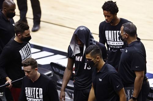 Bam Adebayo #13 of the Miami Heat reacts as he leaves the floor after losing to the Milwaukee Bucks.