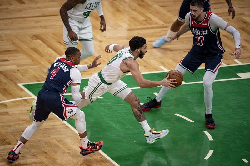 Jayson Tatum #0 of the Boston Celtics drives to the basket during the first half of a game in the play-in tournament against he Washington Wizards